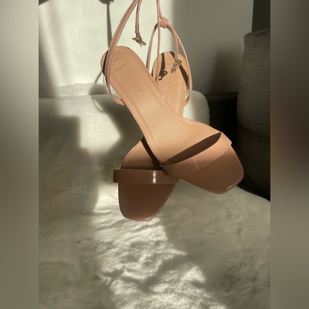 Brand New Look, heels in very good condition never wear. Size US 10 wide.